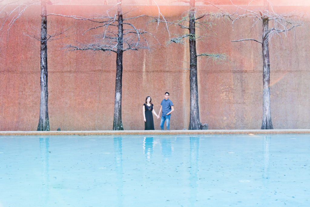 Couple posing in Downtown Fort Worth Water Gardens