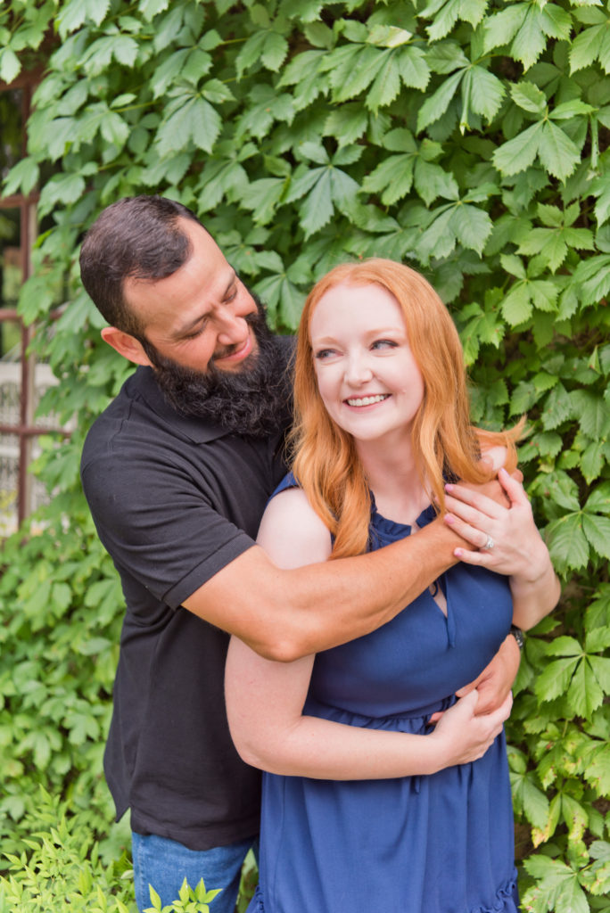 Couple laughing during engagement portraits